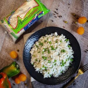 Arrossísimo con guisantes verdes